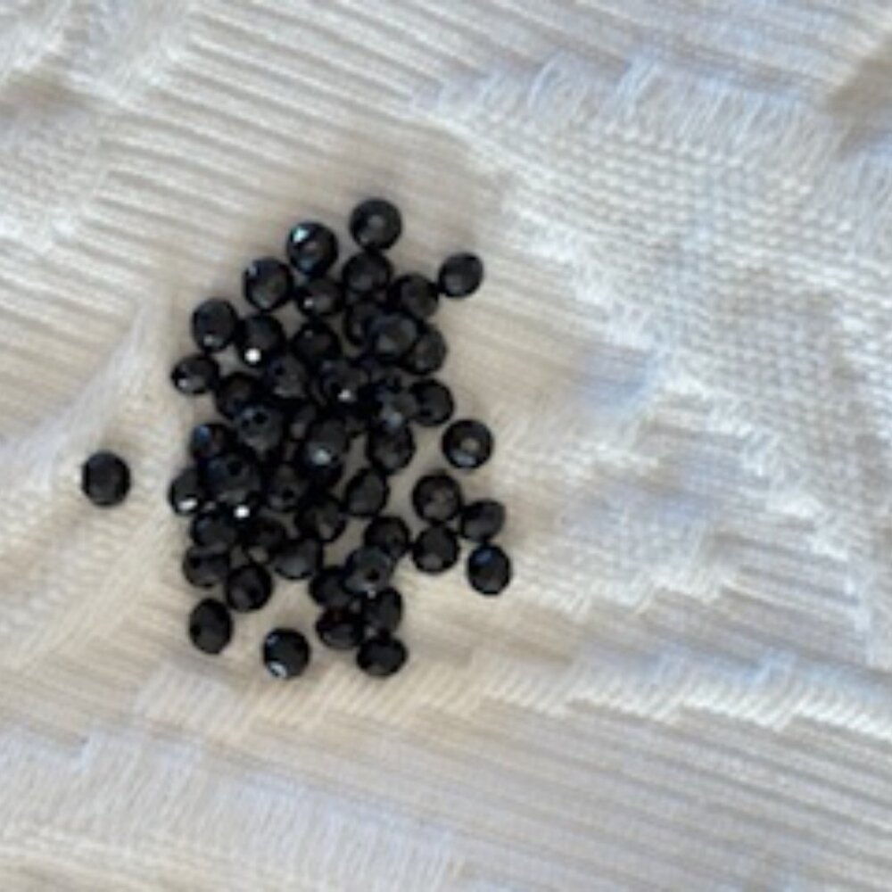 Tiny faceted black spinel beads